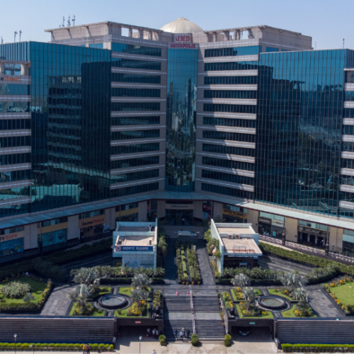 This is a JMD Megapolis building displaying the modern IT park's architectural exterior, a premier development offering premium retail hubs and commercial space for lease in Sector 48, Gurugram.