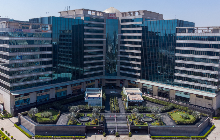This is a JMD Megapolis building displaying the modern IT park's architectural exterior, a premier development offering premium retail hubs and commercial space for lease in Sector 48, Gurugram.