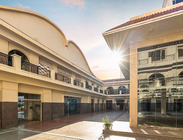 This is a JMD Suburbio 67 building displaying a premium commercial plaza layout, highlighting ground floor retail spaces and premium commercial space for lease in Sector 67, Gurugram.