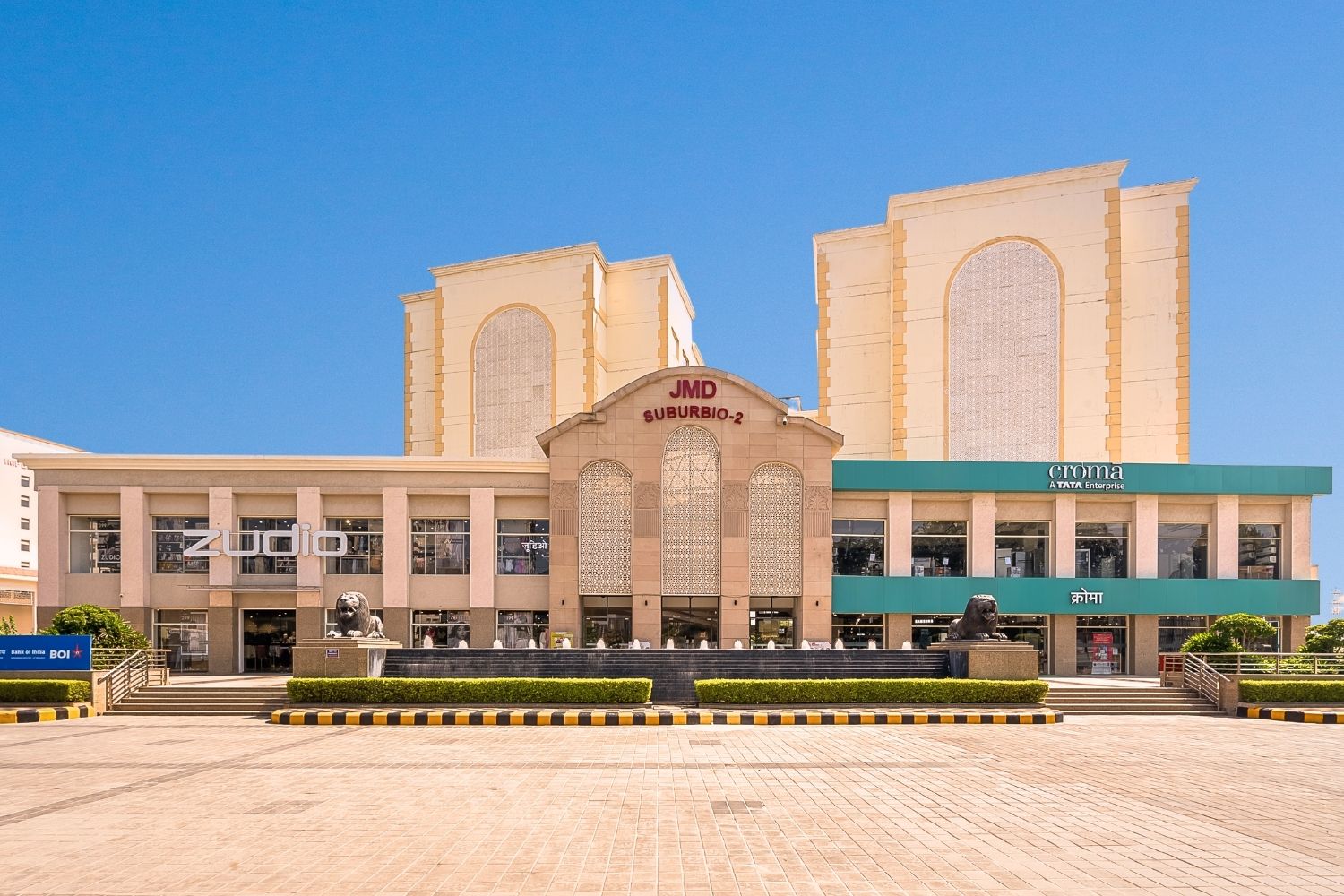 Front view of JMD Suburbio 2 retail spaces in Gurugram, highlighting anchor stores Croma and Zudio.