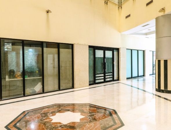 This is a JMD Pacific Square building showcasing ground floor premium retail shops and commercial space for lease.